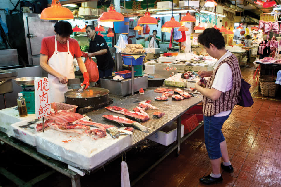 The old-style fresh markets were often slippery and cramped.