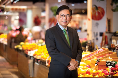 Link REIT CEO George Hongchoy walks through Lok Fu Market, one of the first to be renovated. Link REIT CEO George Hongchoy walks through Lok Fu Market, one of the first to be renovated.